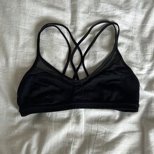 black lululemon sports bra with mesh detailing